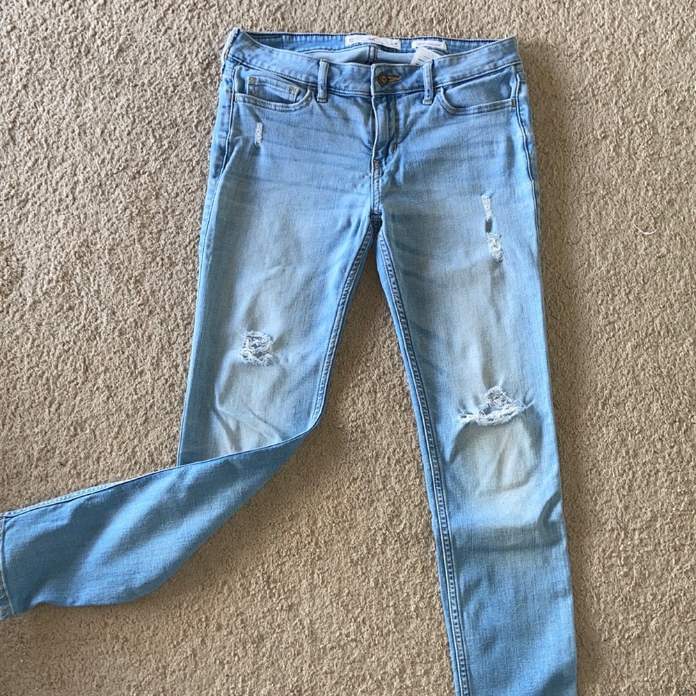 Light Washed Ripped Jeans - Picture 2 of 4